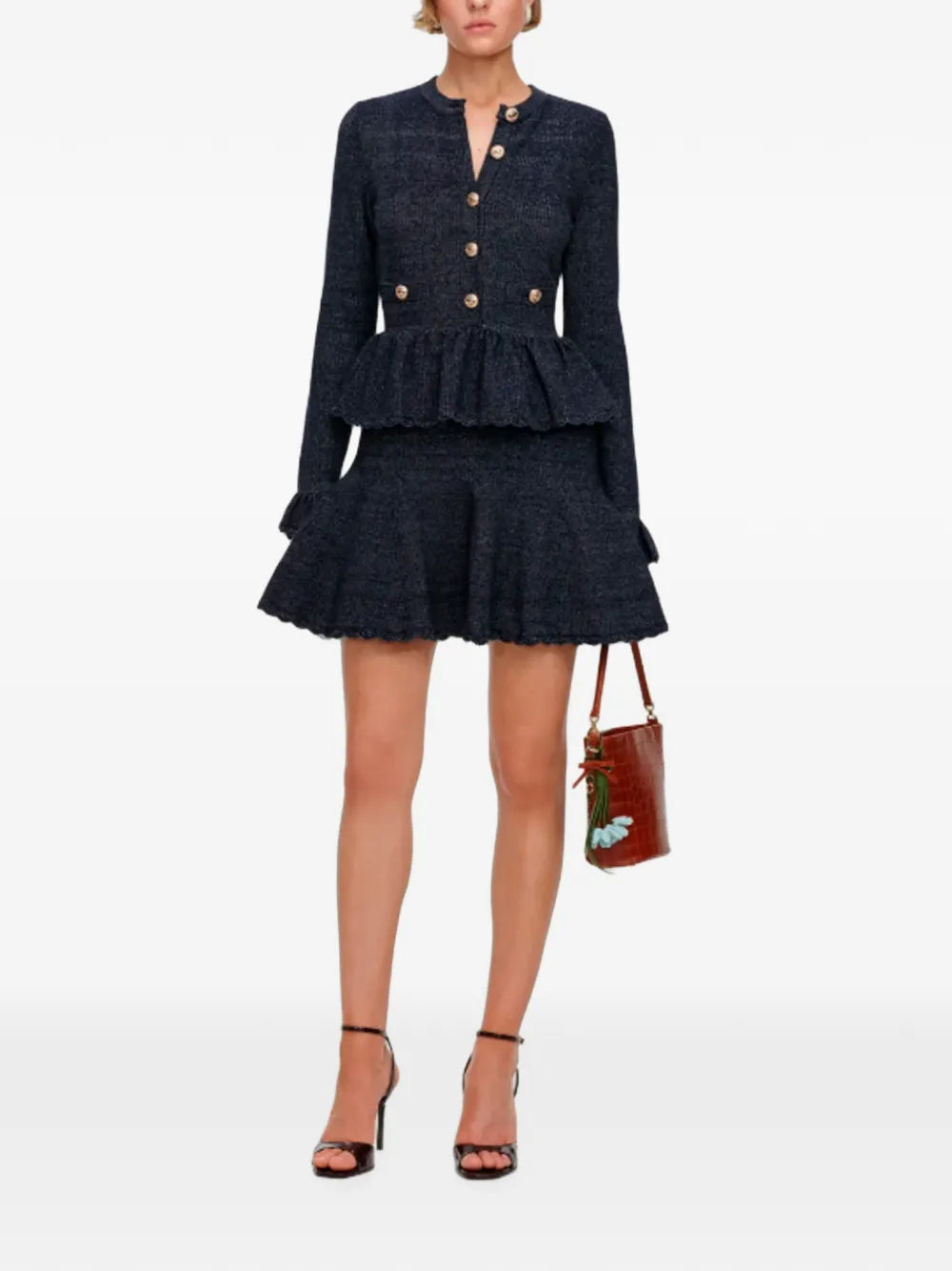 Kleid mit Schößchensaum und gerüschten Ärmelbündchen