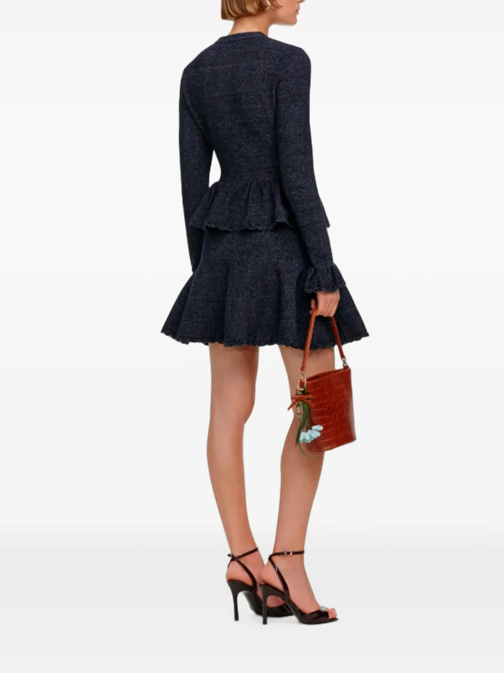 Kleid mit Schößchensaum und gerüschten Ärmelbündchen